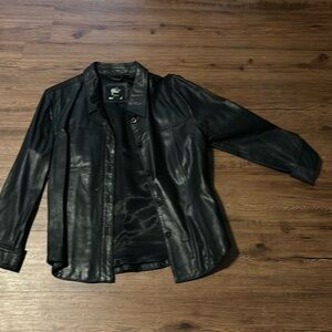 Leather button up shirt with quarter sleeve open to reasonable offers